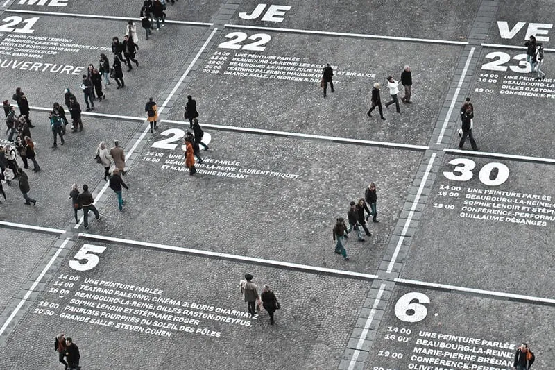 people walking at a city square